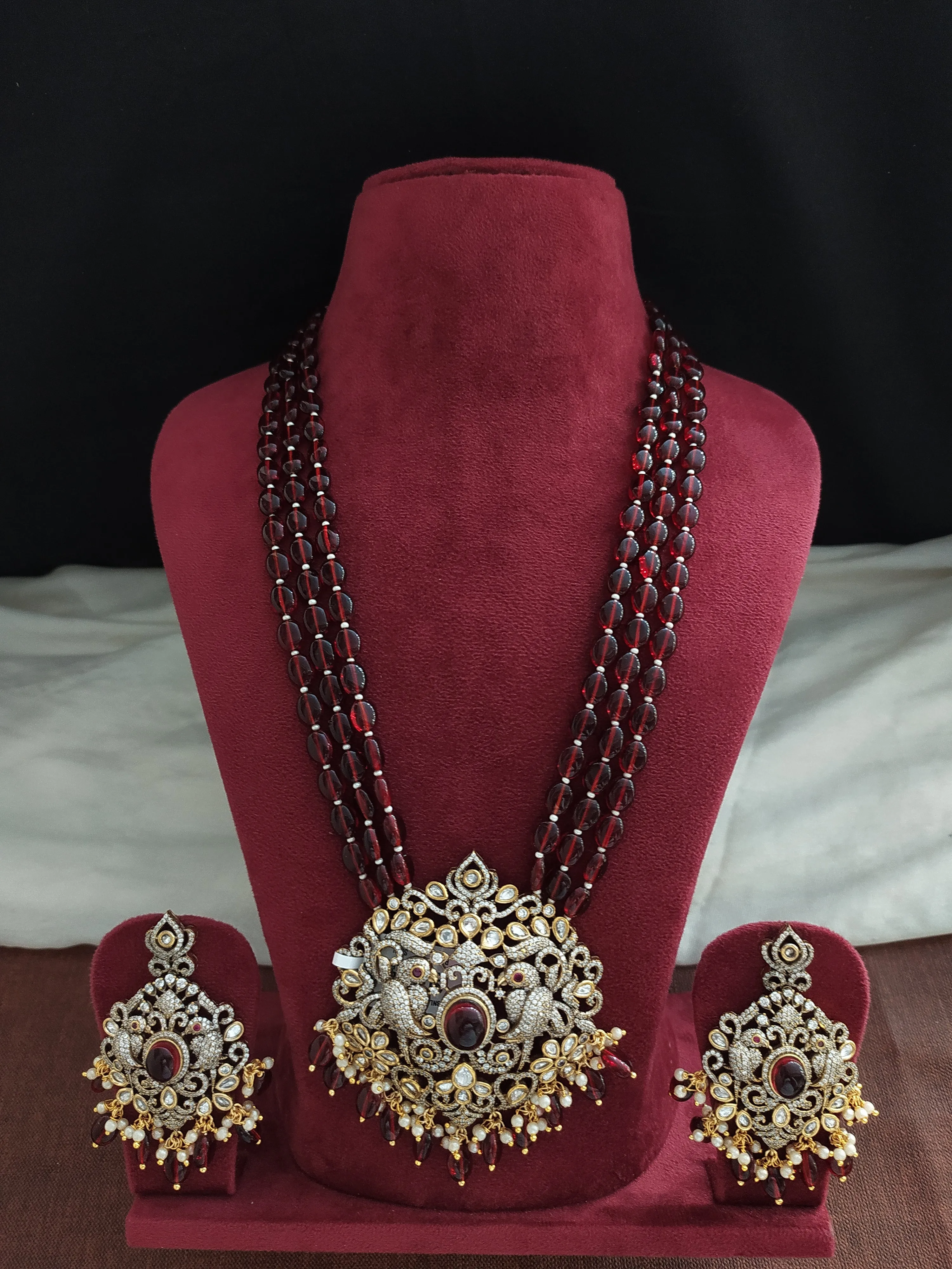 Victorian mala set with a Peacock pendant having Onyx beads