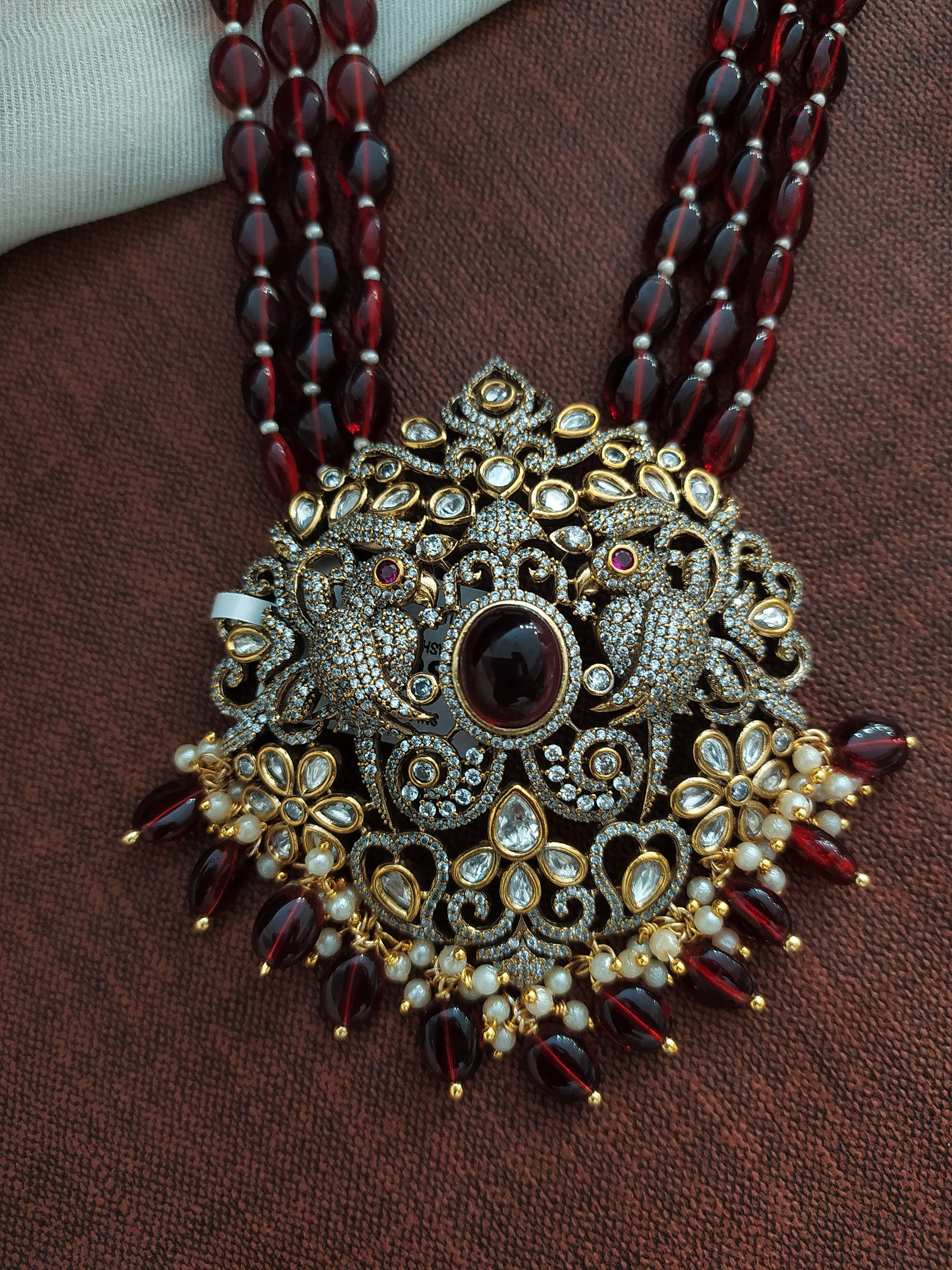 Victorian mala set with a Peacock pendant having Onyx beads