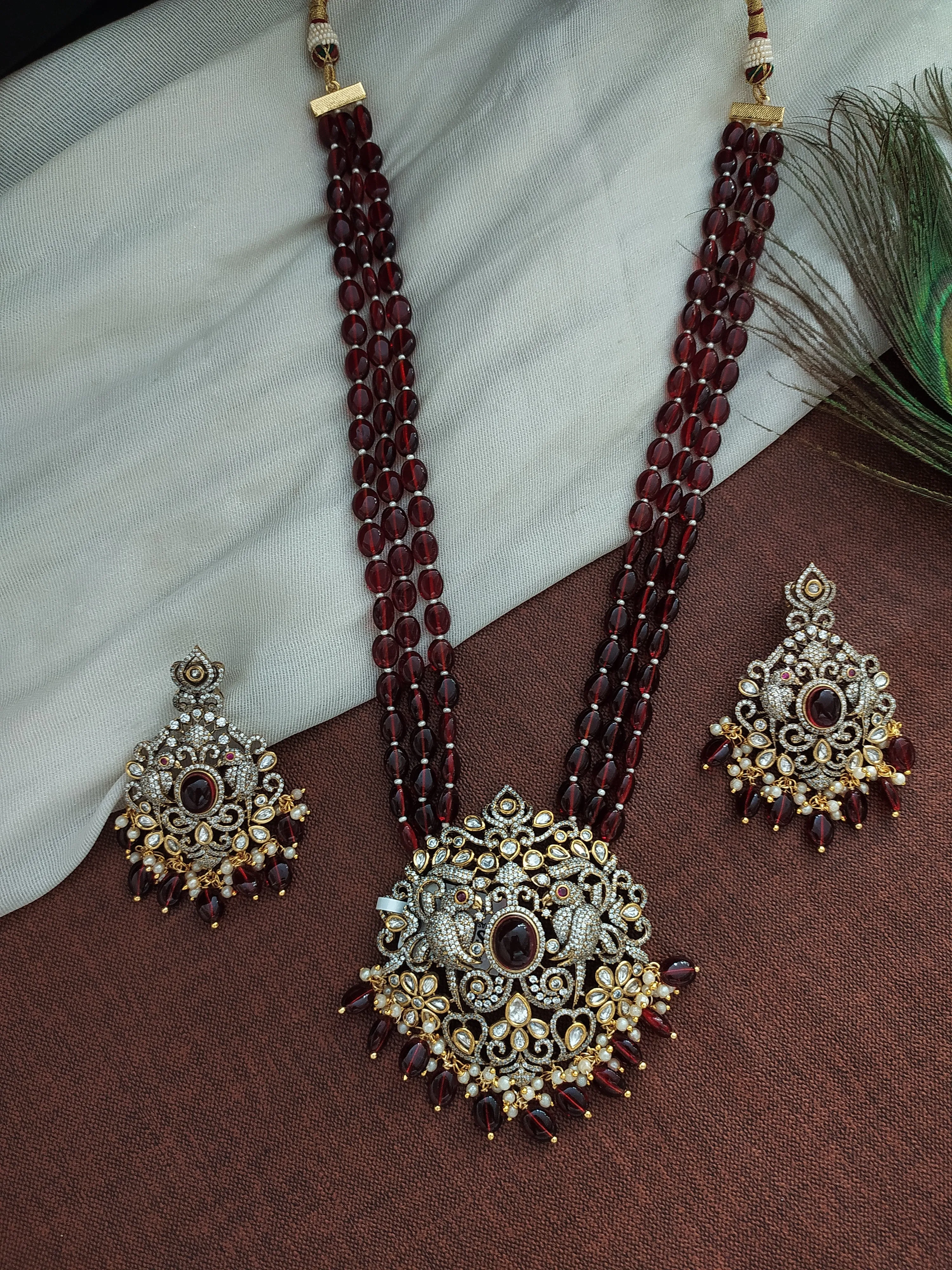 Victorian mala set with a Peacock pendant having Onyx beads